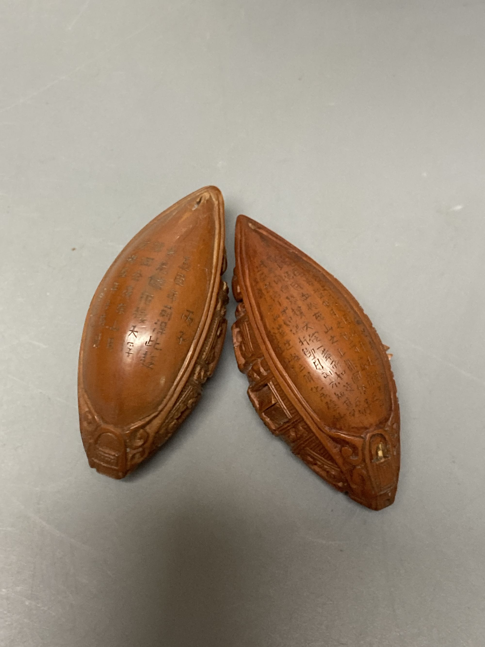 A group of peach stone carvings